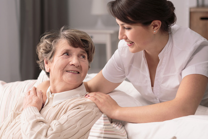 Helpful young pretty woman and lovely older lady