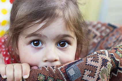 Portrait of cute sad little girl